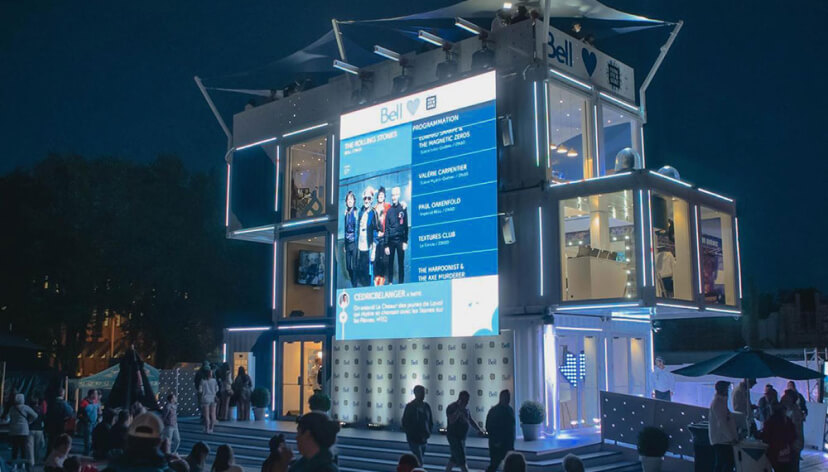 Huge LED display streaming user generated content in a festival.
